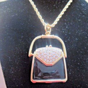 FLASH SALE Swarovski Swan Signed Black Enamel Purse Pendant Necklace that opens.
